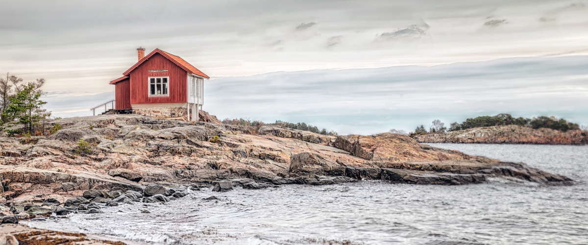 house built on rock by the sea